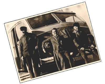 master and assistants in front of a Krupp truck